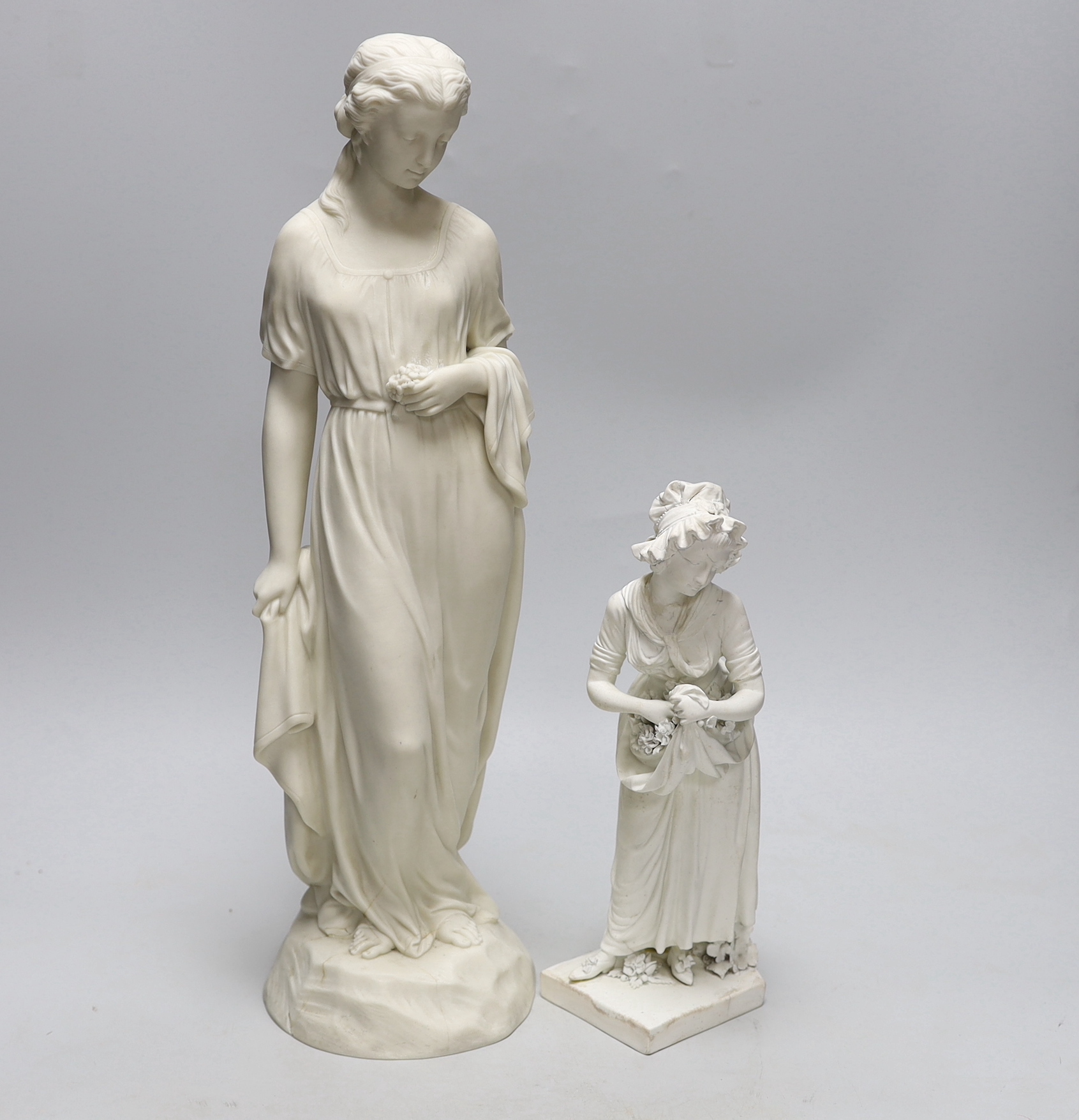 A Derby biscuit figure of a female gardener, c.1780, and a Copeland Parian female figure, the largest 43cm high